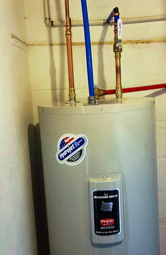 https://claremonthotwater.com.au/uploads/2025/06/electric-hot-water-system-32554.jpg